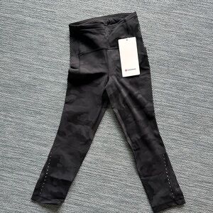 NWT Lululemon swift speed crop. Size 0. Black/Gray camo print
